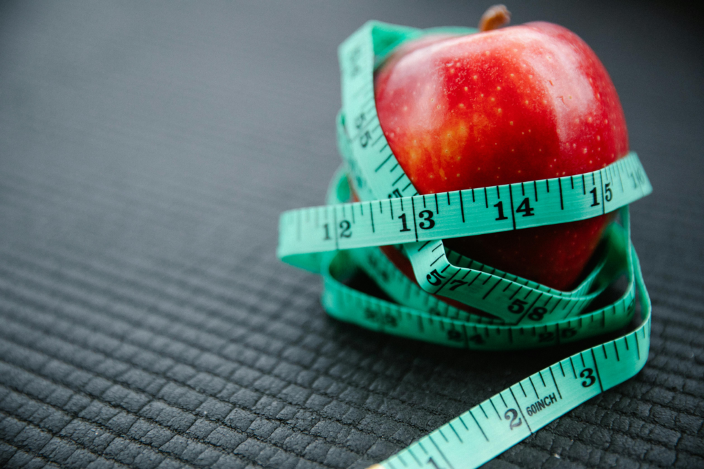apple with tape measure